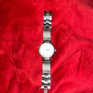 Silver, rhinestone face guess watch